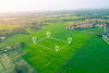 aerial view of grassy land with a plot outlined